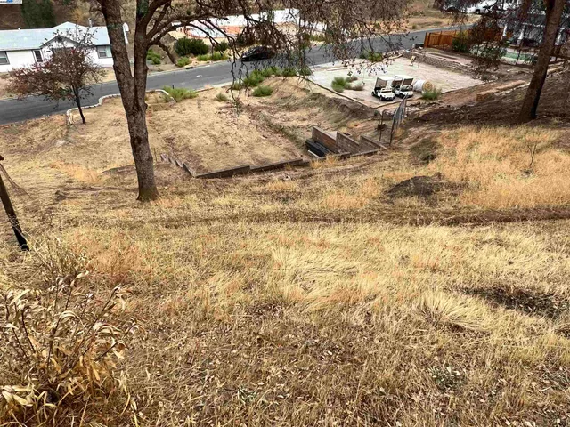 a view of swimming pool with a yard