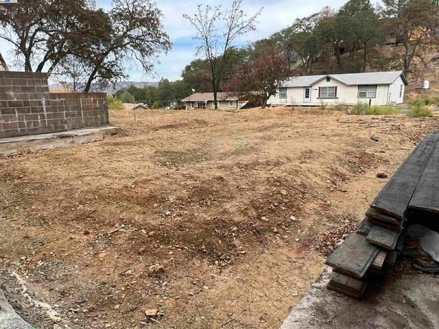a view of yard covered with snow