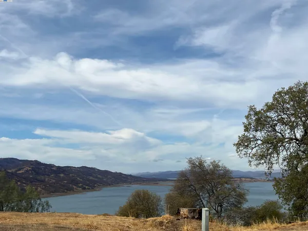 a view of lake with mountain