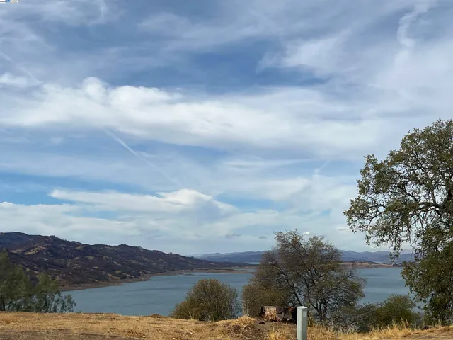 a view of lake with mountain