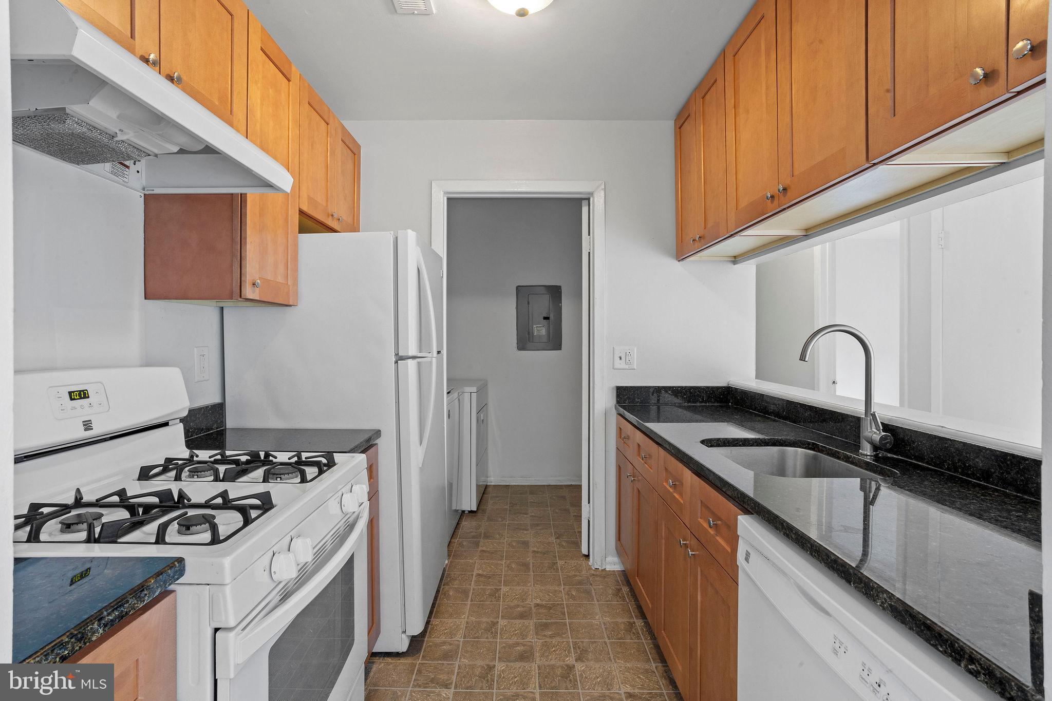 2010 Raven's Row Marlton, NJ 08053 - Photo 8 of 21 a kitchen that has a sink and a stove