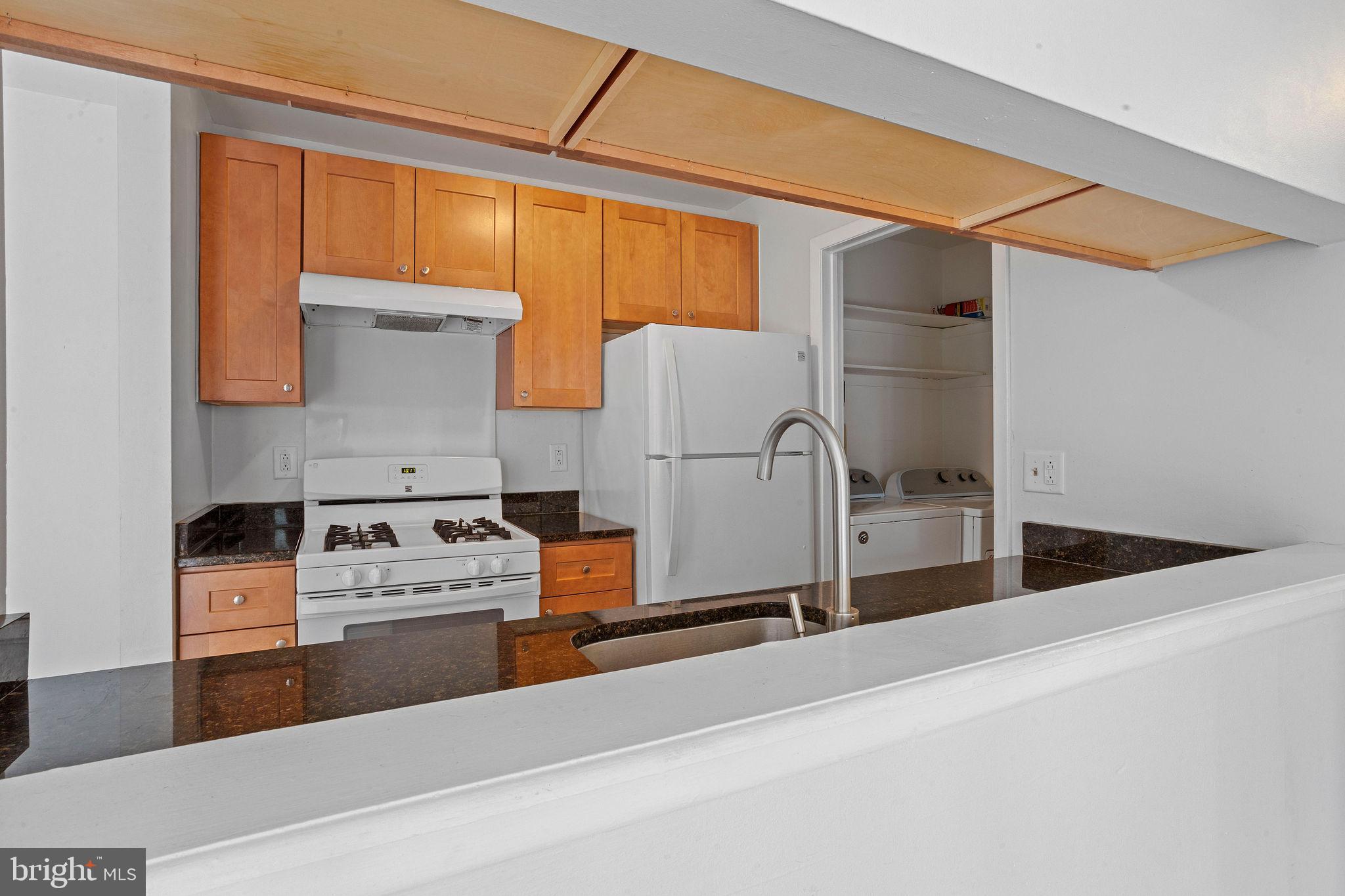 2010 Raven's Row Marlton, NJ 08053 - Photo 9 of 21 a kitchen with a refrigerator and a stove