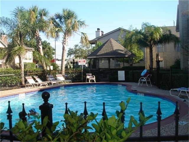 2121 Hepburn Street, Unit 1102 Houston, TX 77054 - Photo 26 of 26 a front view of house with yard and outdoor seating