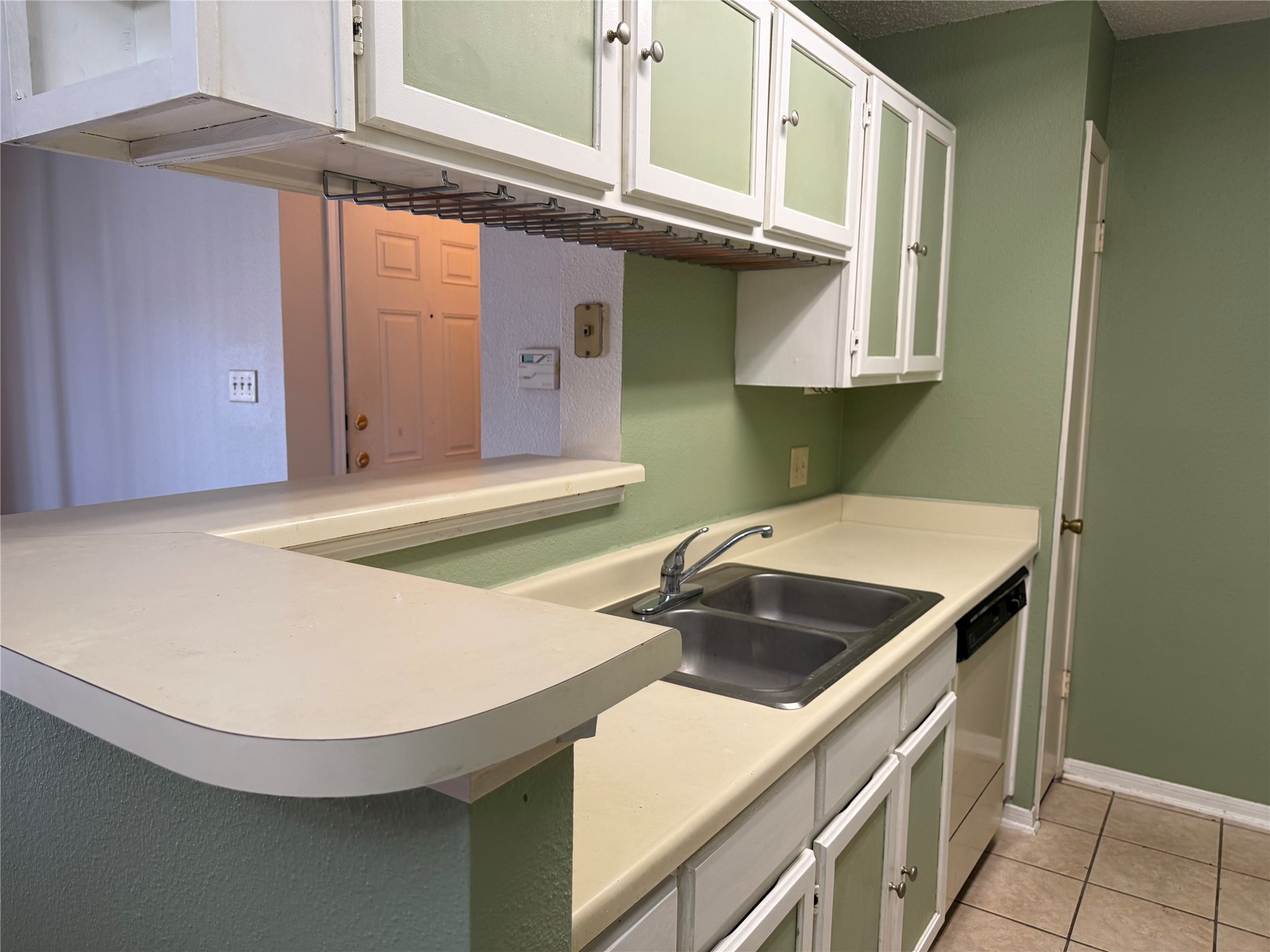 2121 Hepburn Street, Unit 1102 Houston, TX 77054 - Photo 10 of 26 a kitchen with a sink and cabinets