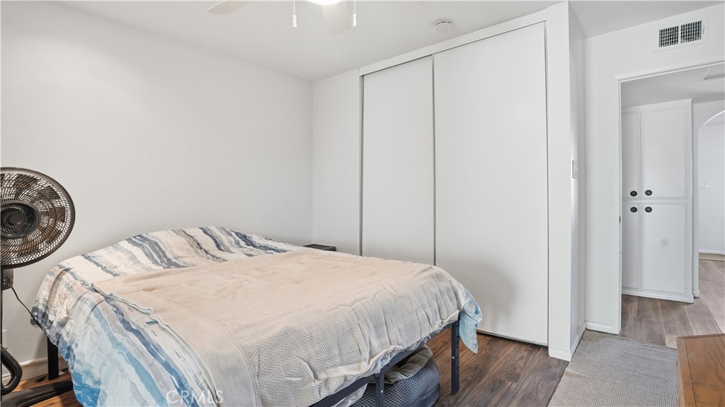 3599 Nina Street Oceanside, CA 92056 - Photo 20 of 32 a bedroom with a bed and a closet