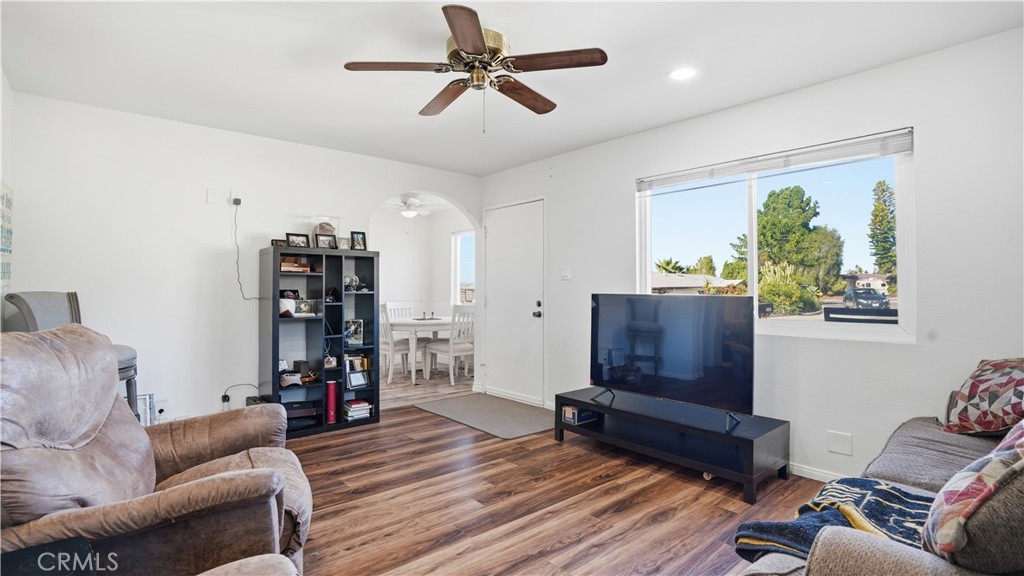 3599 Nina Street Oceanside, CA 92056 - Photo 4 of 32 a living room with furniture and a wooden floor