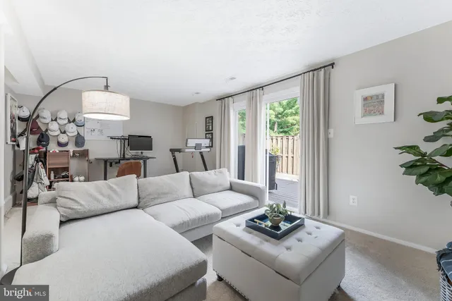 a living room with furniture and furniture