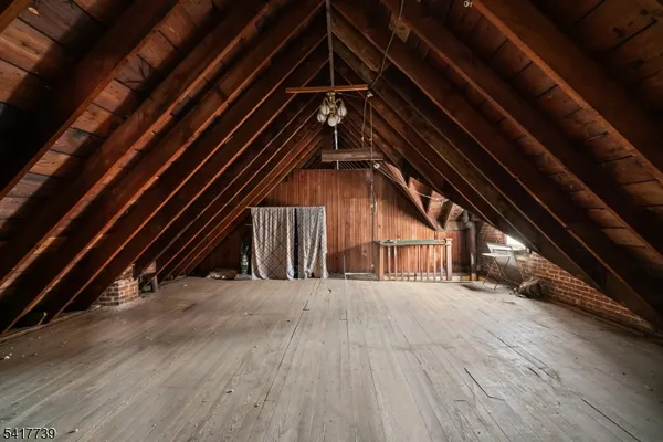 a view of wooden floor in an empty room