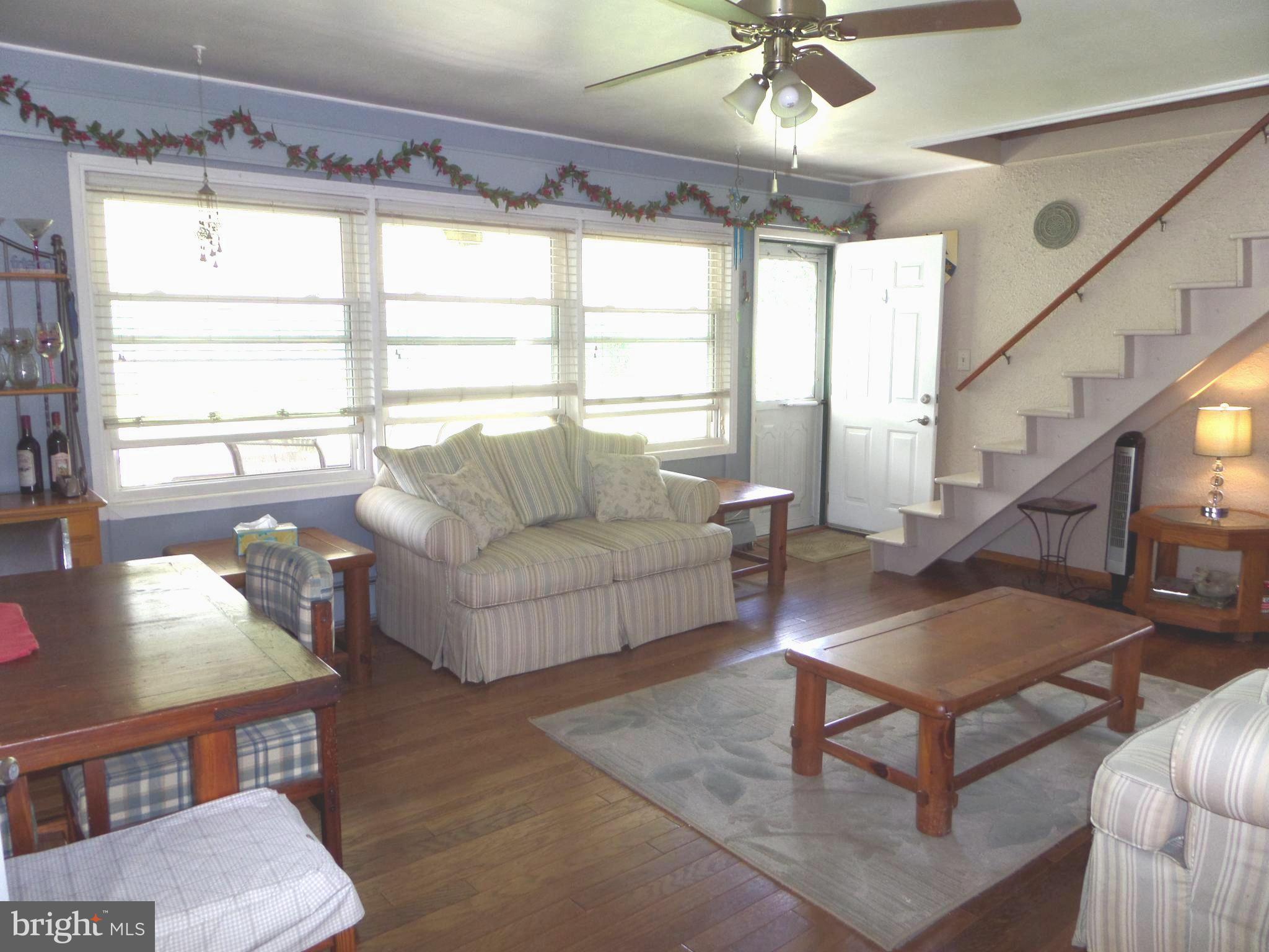 14 Inland Road Levittown, PA 19057 - Photo 3 of 33 NICE livingroom, check out the Wall of WINDOWS!