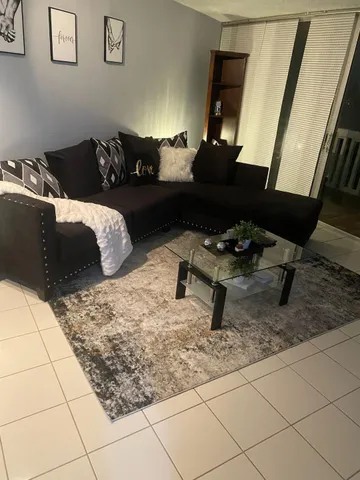 a living room with furniture