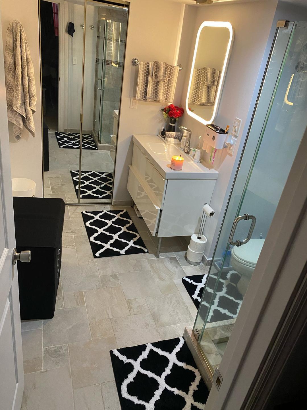 6921 Environ Boulevard, Unit 7N Lauderhill, FL 33319 - Photo 5 of 11 a kitchen with a sink a stove and a refrigerator