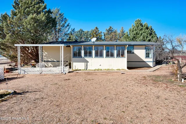 a house view with a outdoor space