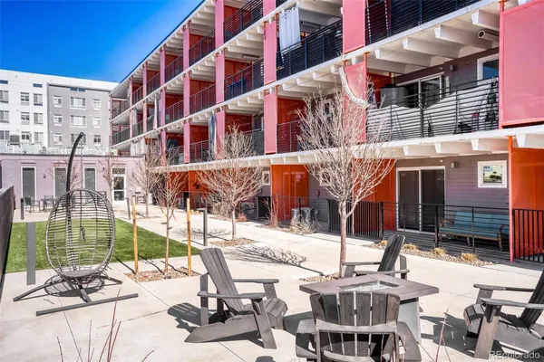 a view of a building with backyard