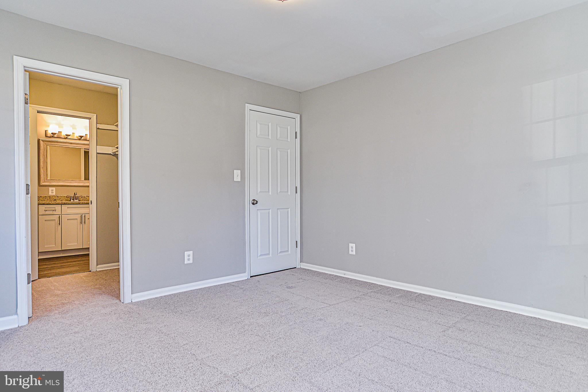 5905 Bayshire Road, Unit 178 Springfield, VA 22152 - Photo 15 of 33 M. Bedroom looking through closet to bathroom