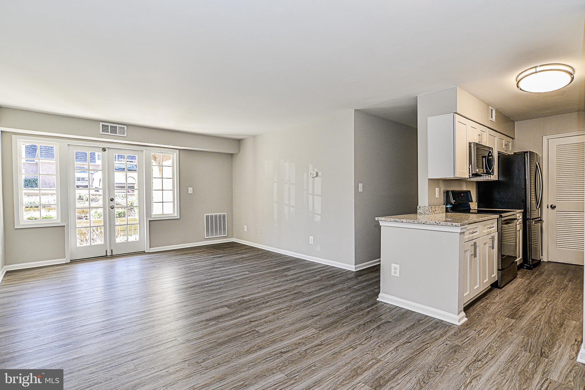 5905 Bayshire Road, Unit 178 Springfield, VA 22152 - Photo 3 of 33 Living-room & Kitchen from Dining area