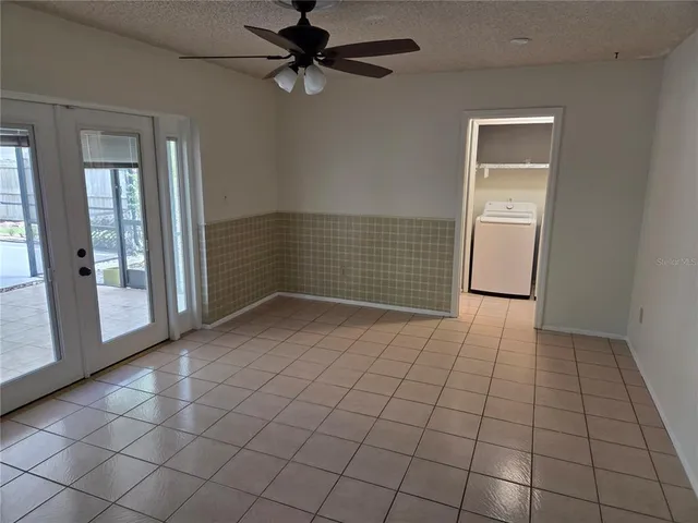 a view of an empty room and window