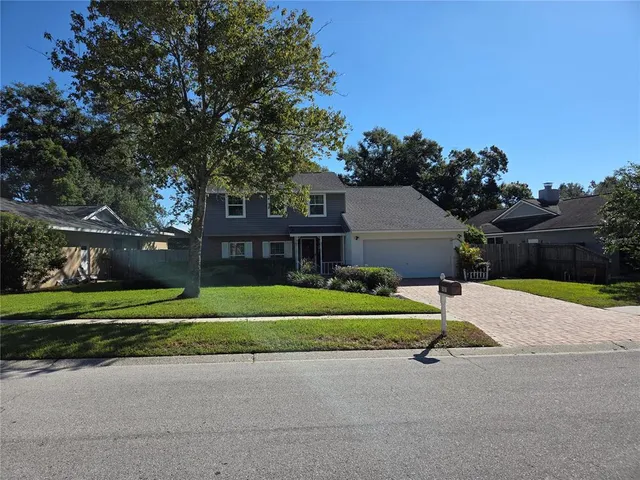 a house with trees in front of it