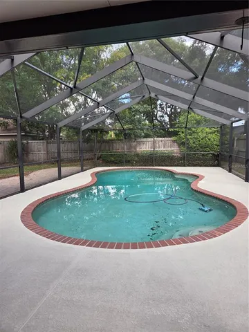 a view of a house with a swimming pool