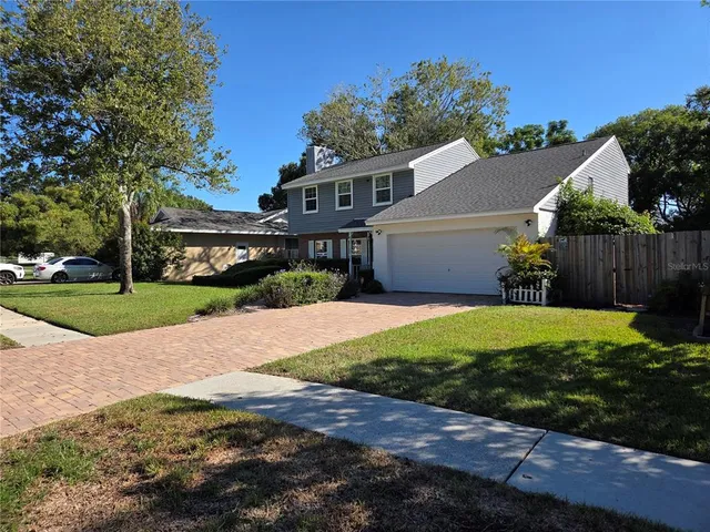 a view of a backyard with a garden