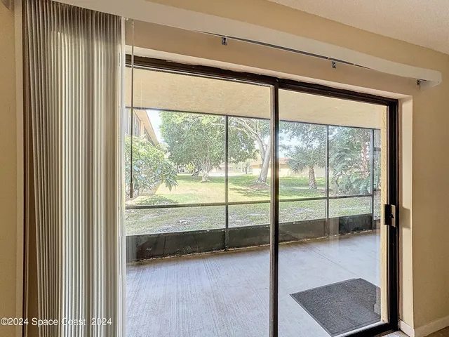 a view of a room with an outdoor space