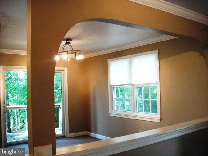 262 Lake Riviera Road Pasadena, MD 21122 - Photo 11 of 25 built-in desk area in family room