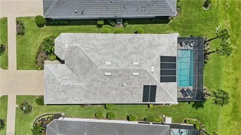 a aerial view of a house with a garden