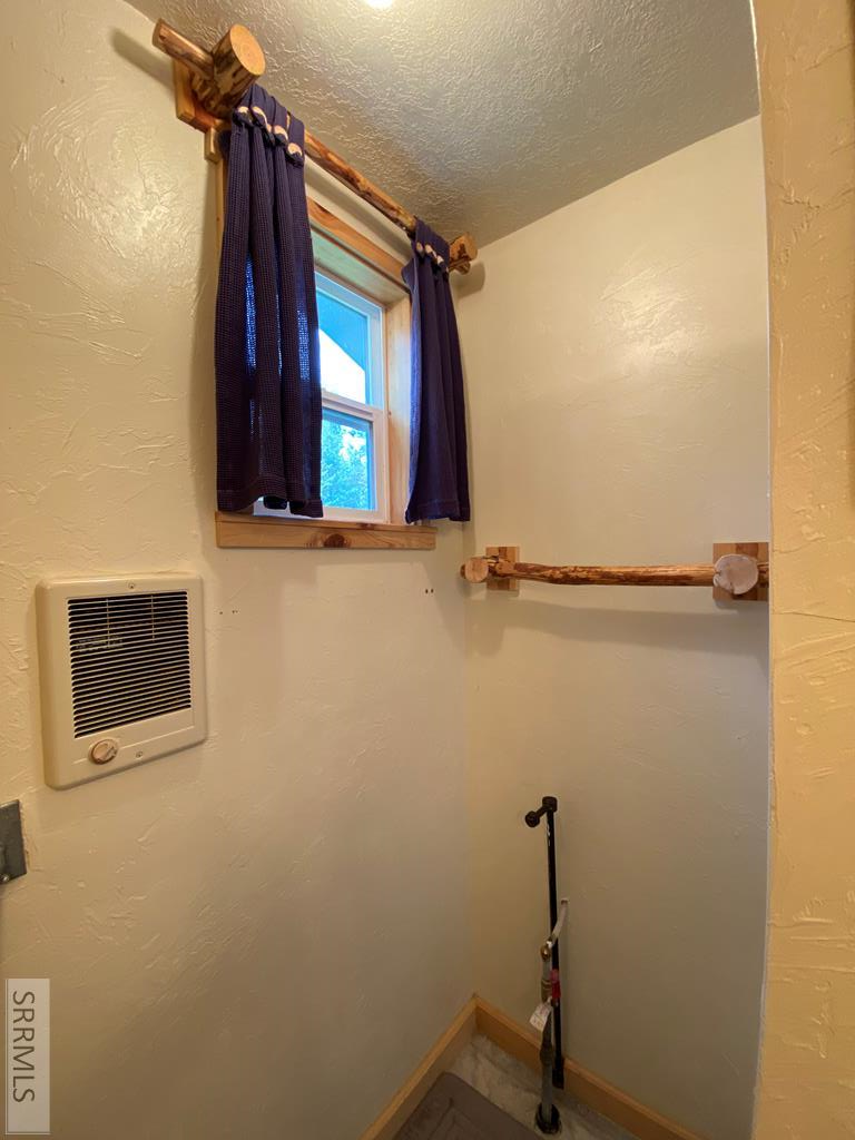 4175 South Big Springs Loop Road Island Park, ID 83429 - Photo 34 of 48 Garage bathroom