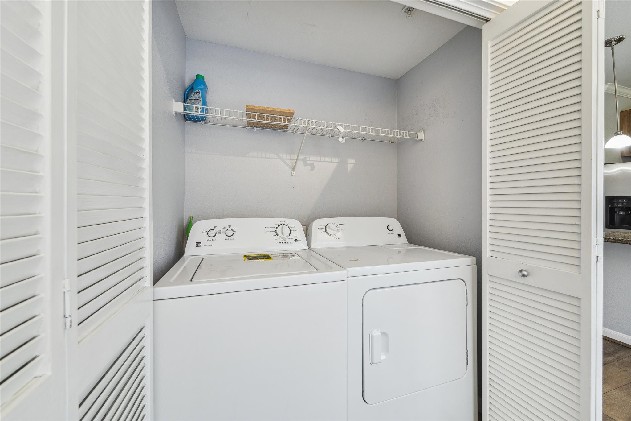 9200 Westheimer Road, Unit 907 Houston, TX 77063 - Photo 6 of 27 a utility room with dryer and washer