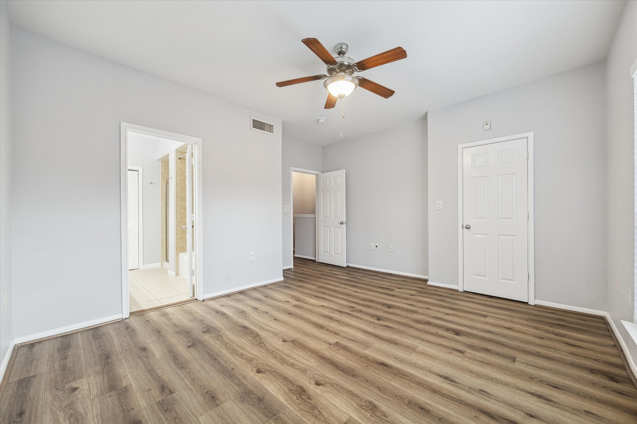 9200 Westheimer Road, Unit 907 Houston, TX 77063 - Photo 8 of 27 wooden floor in an empty room