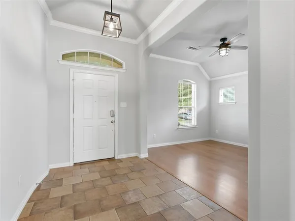 a kitchen with a sink stove and refrigerator