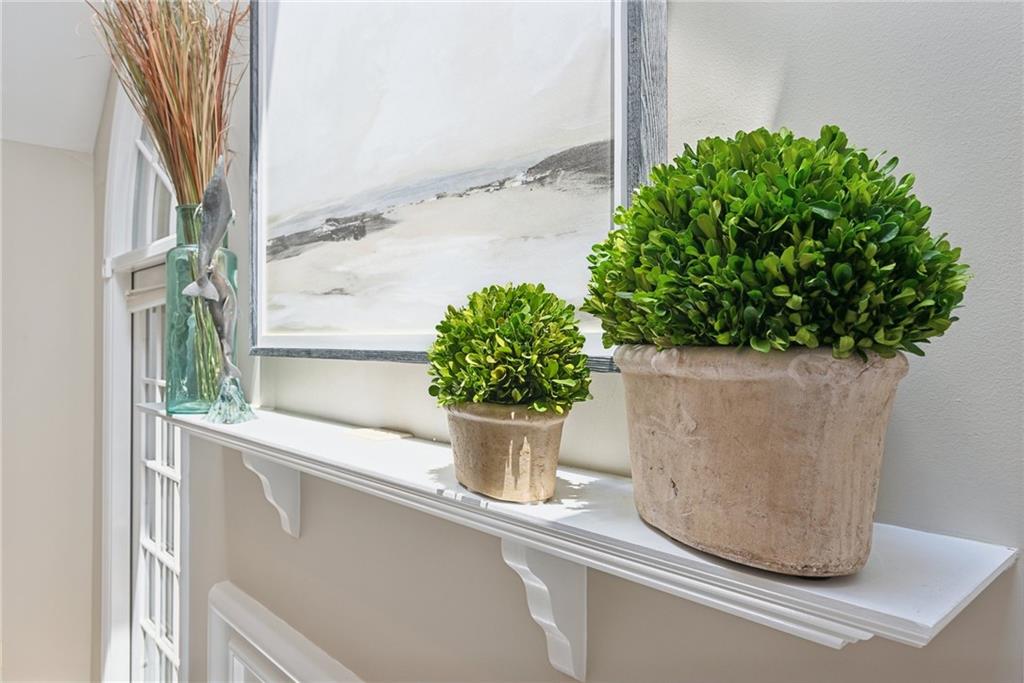 1107 Laurelview Drive Latrobe, PA 15650 - Photo 11 of 50 a white vase with flowers and a window