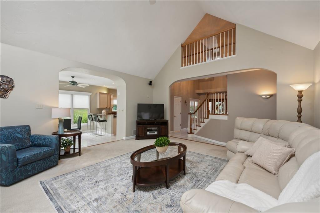 1107 Laurelview Drive Latrobe, PA 15650 - Photo 13 of 50 a living room with furniture and a wooden floor