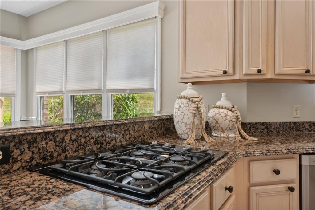 1107 Laurelview Drive Latrobe, PA 15650 - Photo 17 of 50 a kitchen with a stove and a white cabinet