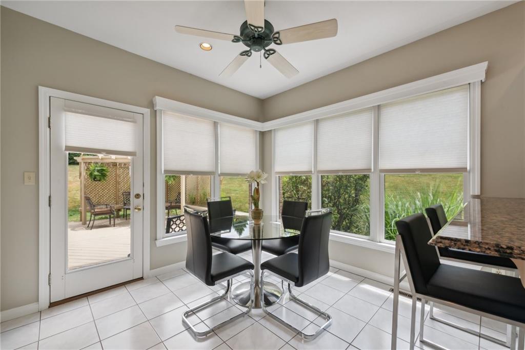 1107 Laurelview Drive Latrobe, PA 15650 - Photo 19 of 50 a living room with furniture and floor to ceiling windows