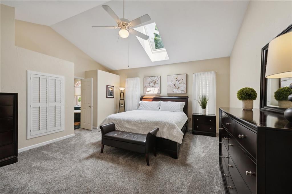 1107 Laurelview Drive Latrobe, PA 15650 - Photo 22 of 50 a spacious bedroom with a bed a ceiling fan and a dresser