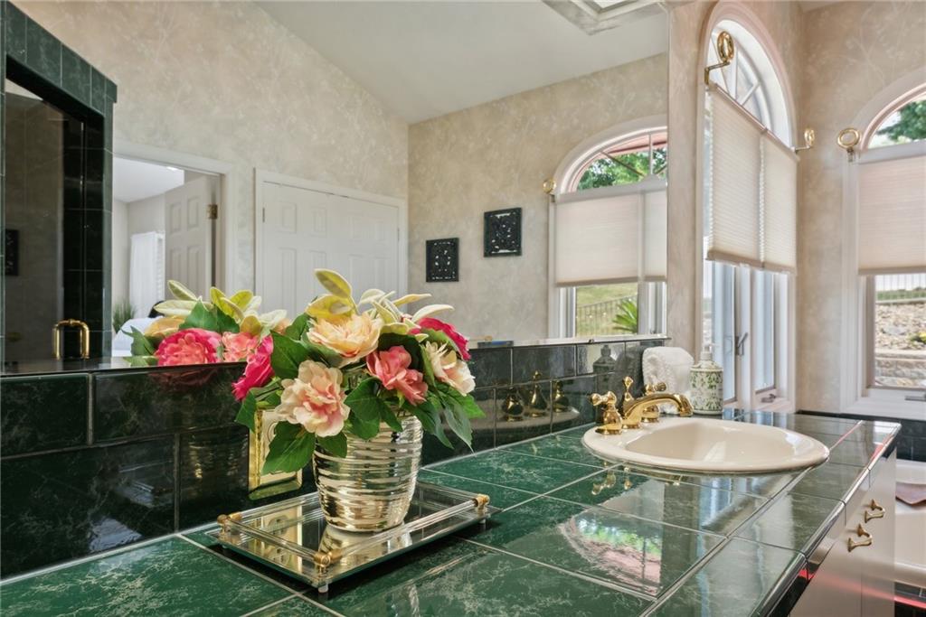 1107 Laurelview Drive Latrobe, PA 15650 - Photo 25 of 50 a dining room with furniture and a floor to ceiling window