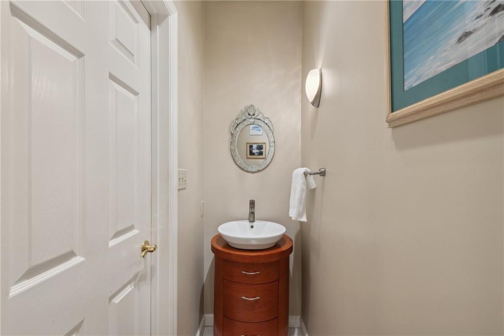 1107 Laurelview Drive Latrobe, PA 15650 - Photo 32 of 50 a bathroom with a toilet a sink and mirror