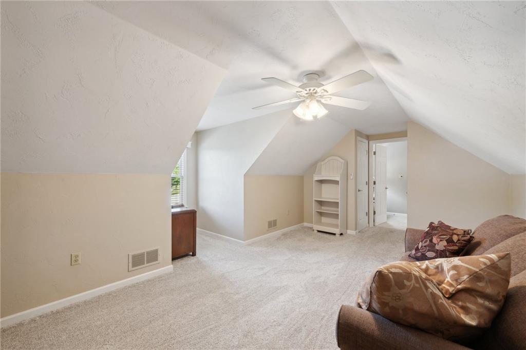 1107 Laurelview Drive Latrobe, PA 15650 - Photo 42 of 50 a living room with furniture and white ceiling fan