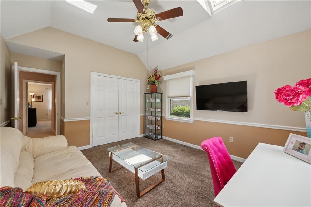 1107 Laurelview Drive Latrobe, PA 15650 - Photo 45 of 50 a living room with furniture and a flat screen tv