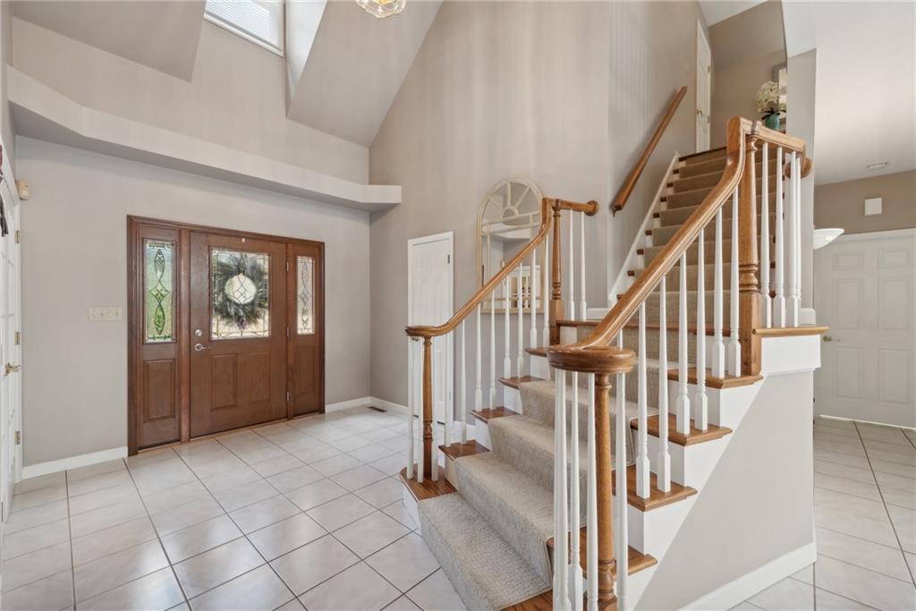 1107 Laurelview Drive Latrobe, PA 15650 - Photo 7 of 50 a view of an entryway with staircase