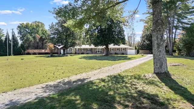 a view of room with window and wooden floor