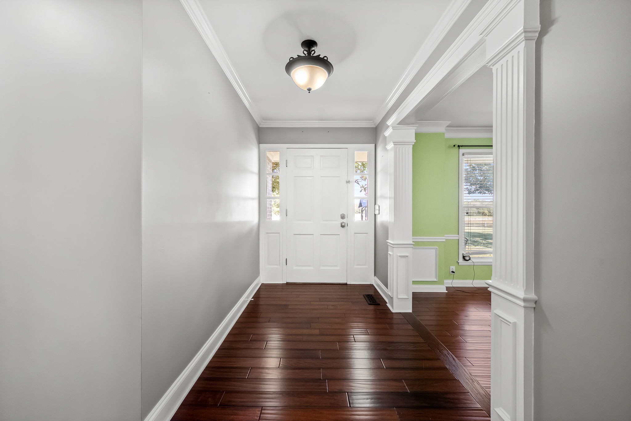 2329 Dilton Mankin Road Murfreesboro, TN 37127 - Photo 28 of 95 a view of an empty room with wooden floor and a window