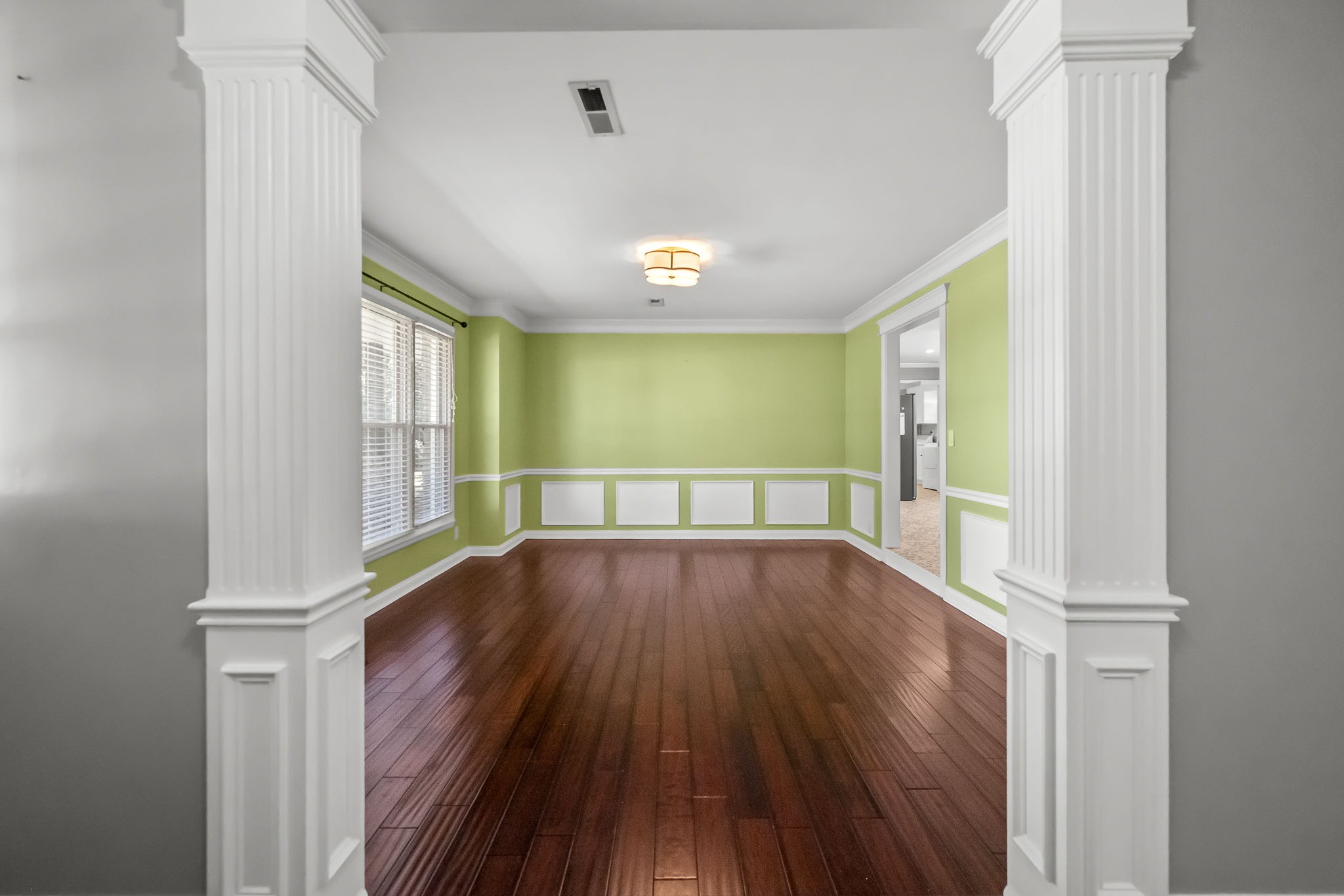 2329 Dilton Mankin Road Murfreesboro, TN 37127 - Photo 29 of 95 a view of an empty room with wooden floor and a window
