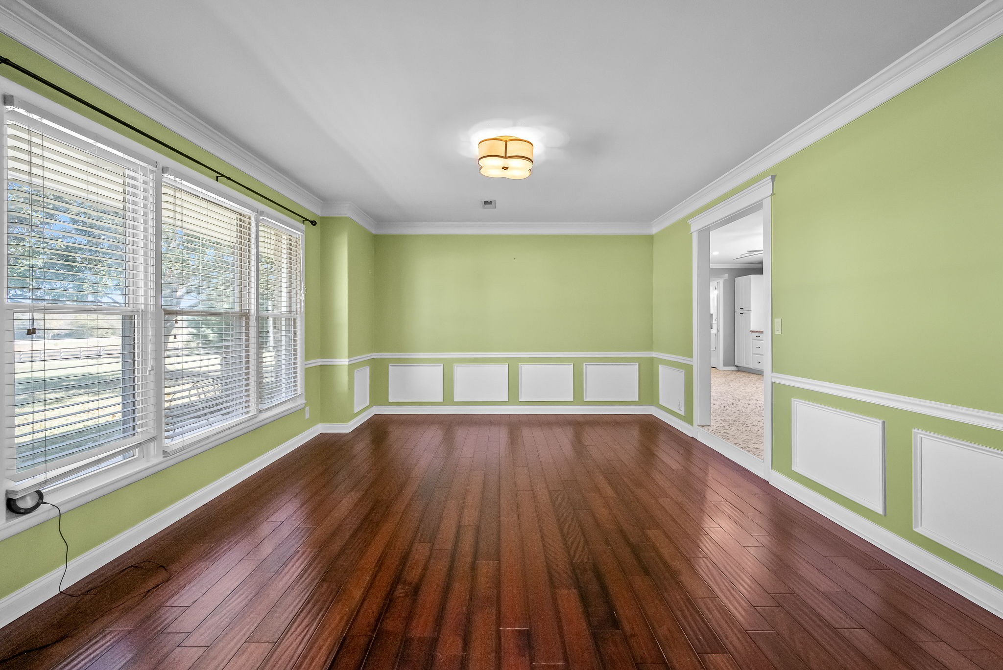2329 Dilton Mankin Road Murfreesboro, TN 37127 - Photo 30 of 95 a view of an empty room with wooden floor and a window