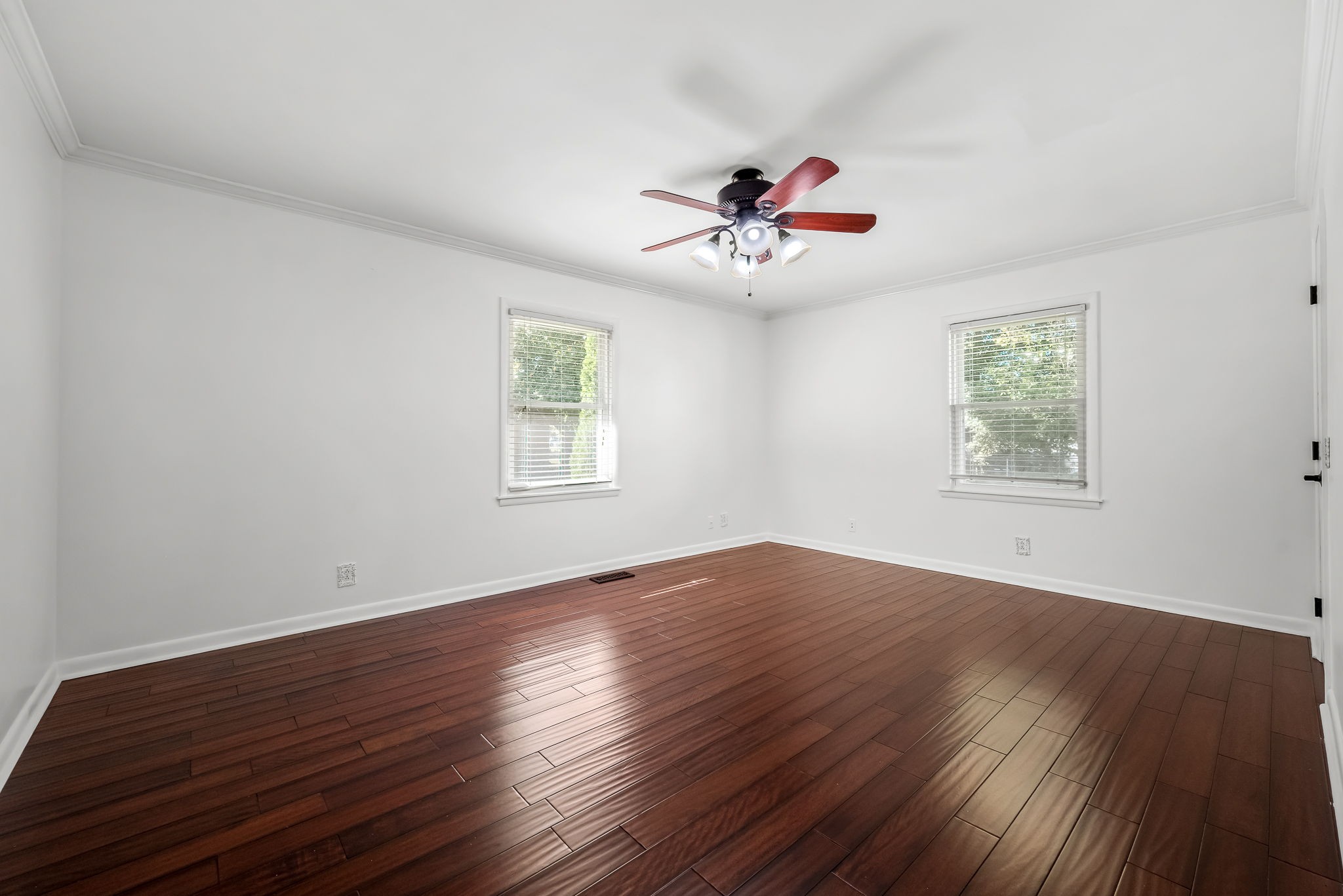 2329 Dilton Mankin Road Murfreesboro, TN 37127 - Photo 33 of 95 a view of an empty room with wooden floor and a window