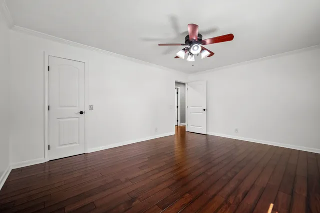 a view of a balcony with wooden floor