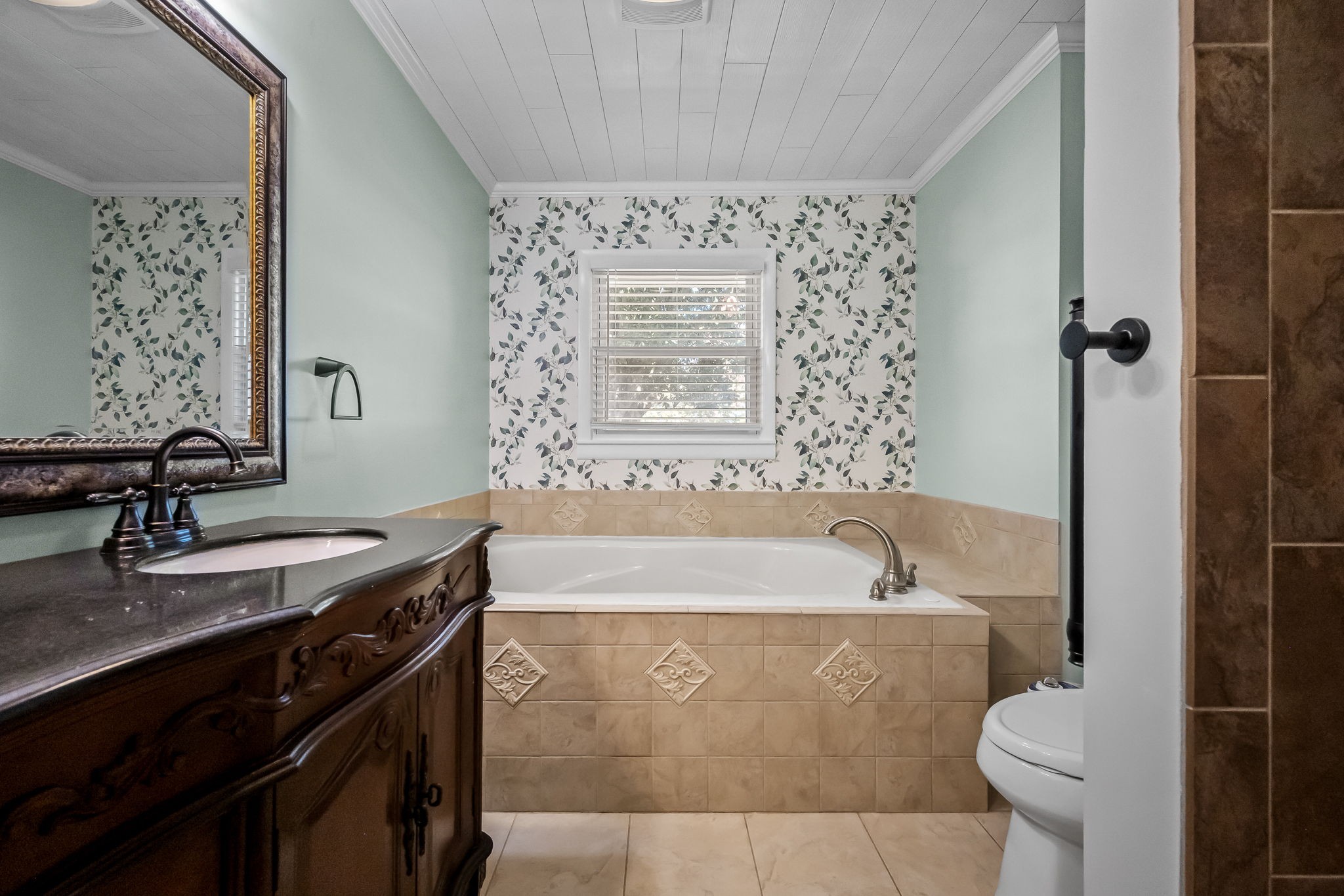 2329 Dilton Mankin Road Murfreesboro, TN 37127 - Photo 37 of 95 a bathroom with a bathtub and a sink