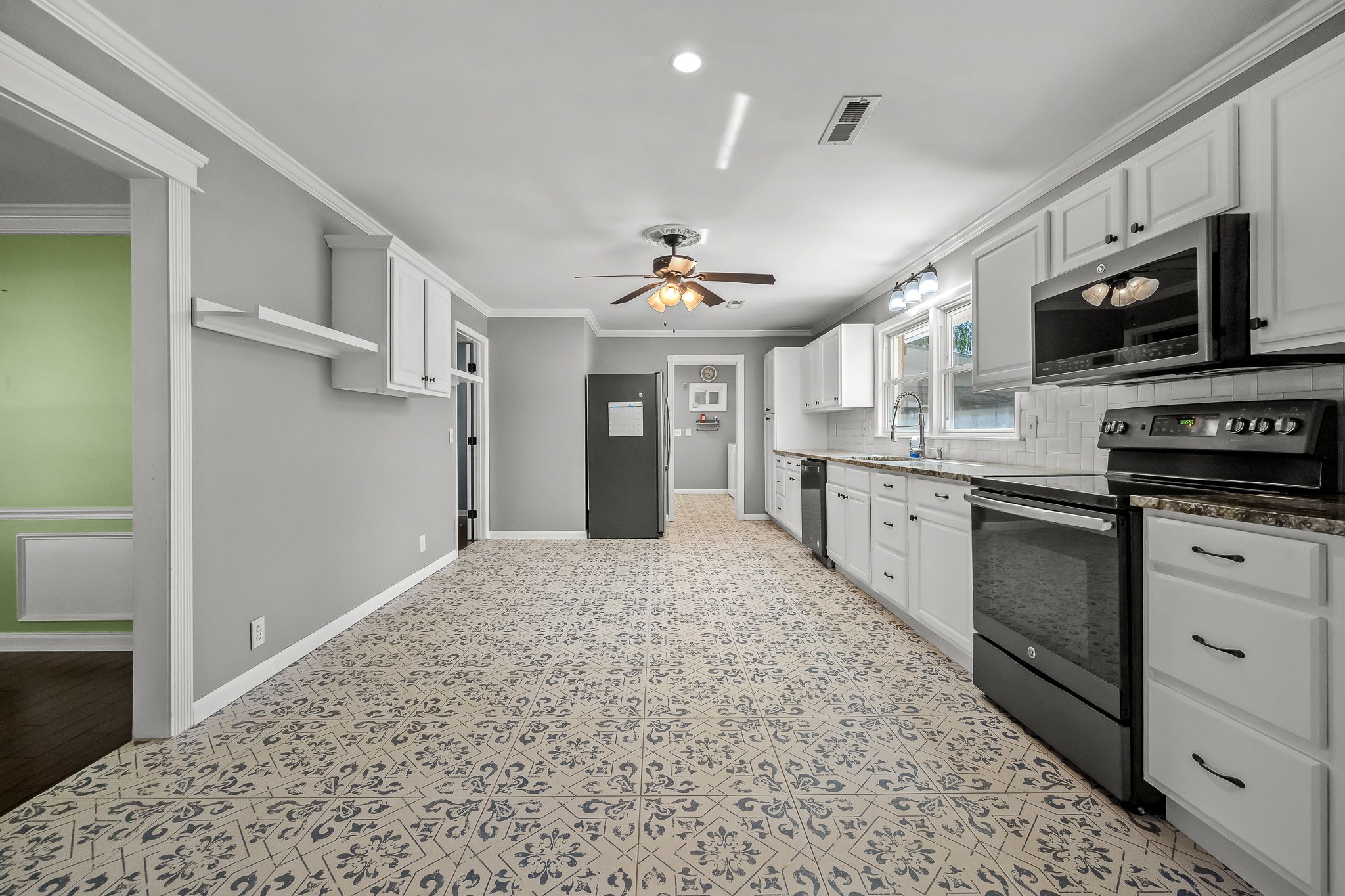 2329 Dilton Mankin Road Murfreesboro, TN 37127 - Photo 44 of 95 a large kitchen with cabinets