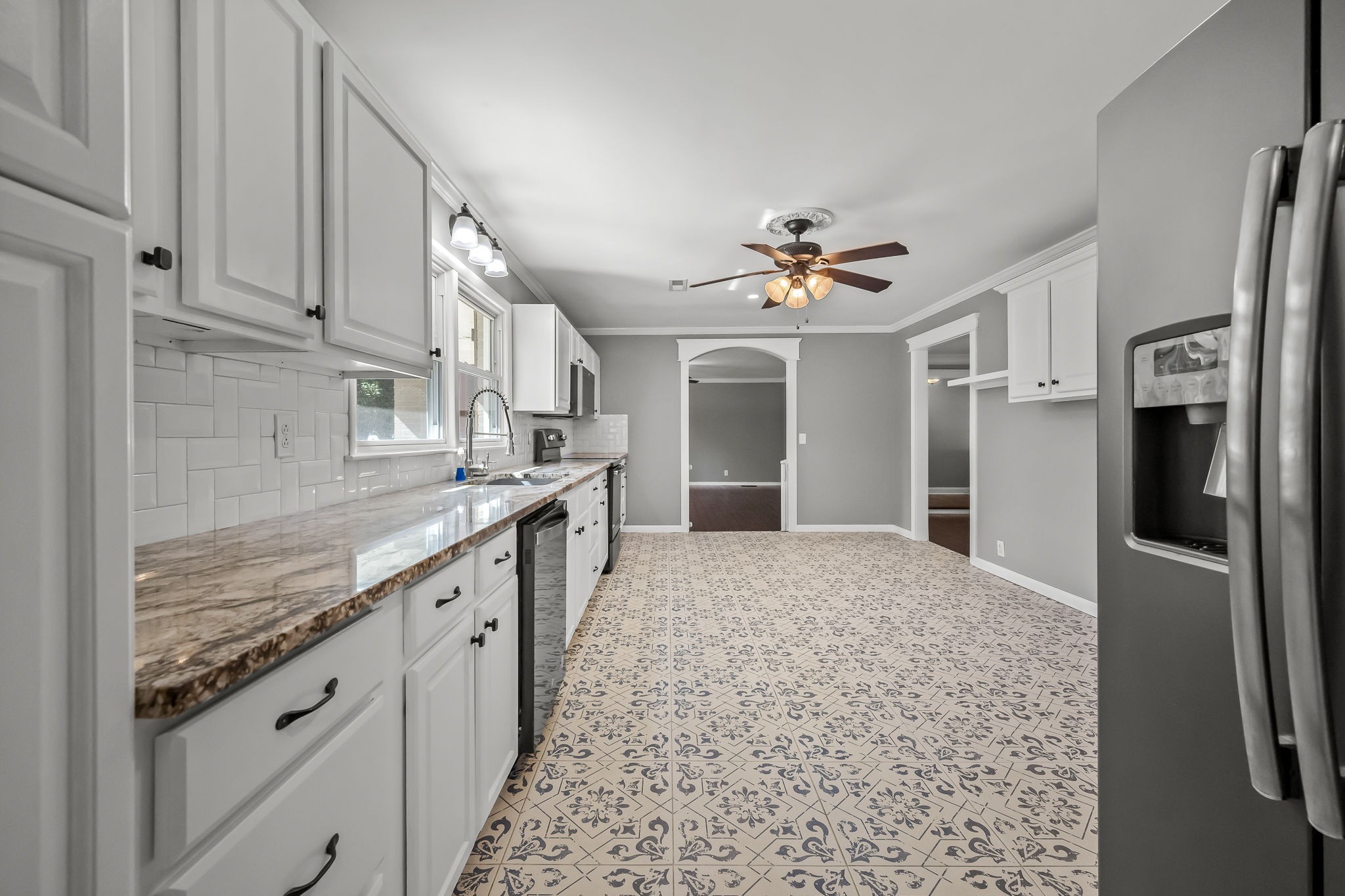 2329 Dilton Mankin Road Murfreesboro, TN 37127 - Photo 48 of 95 a kitchen with stainless steel appliances granite countertop a refrigerator and a sink
