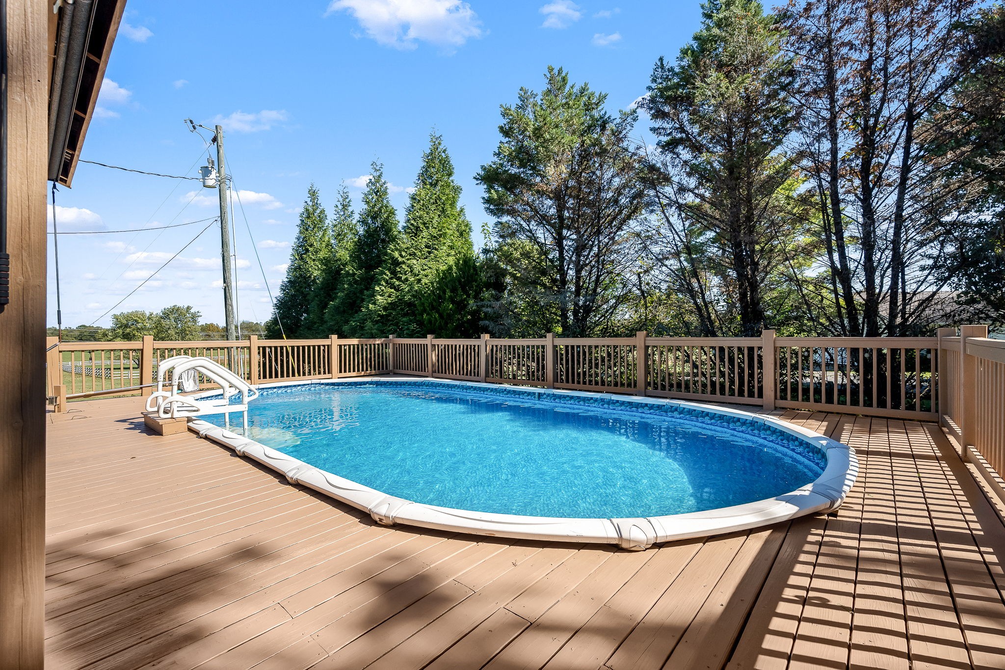2329 Dilton Mankin Road Murfreesboro, TN 37127 - Photo 74 of 95 a view of a swimming pool with a lounge chair
